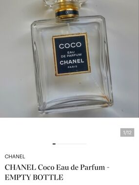 CHANEL clear glass perfume bottle with black and gold label